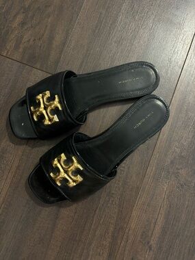 Tory Burch Black Leather Slide Mules with Gold Logo Accent